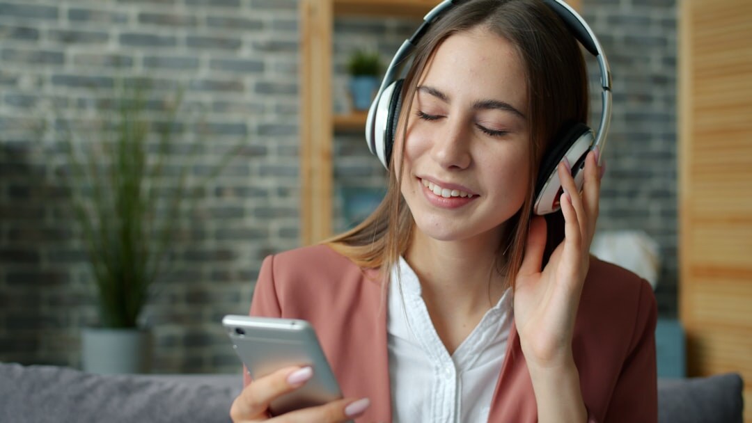 woman listening to podcast