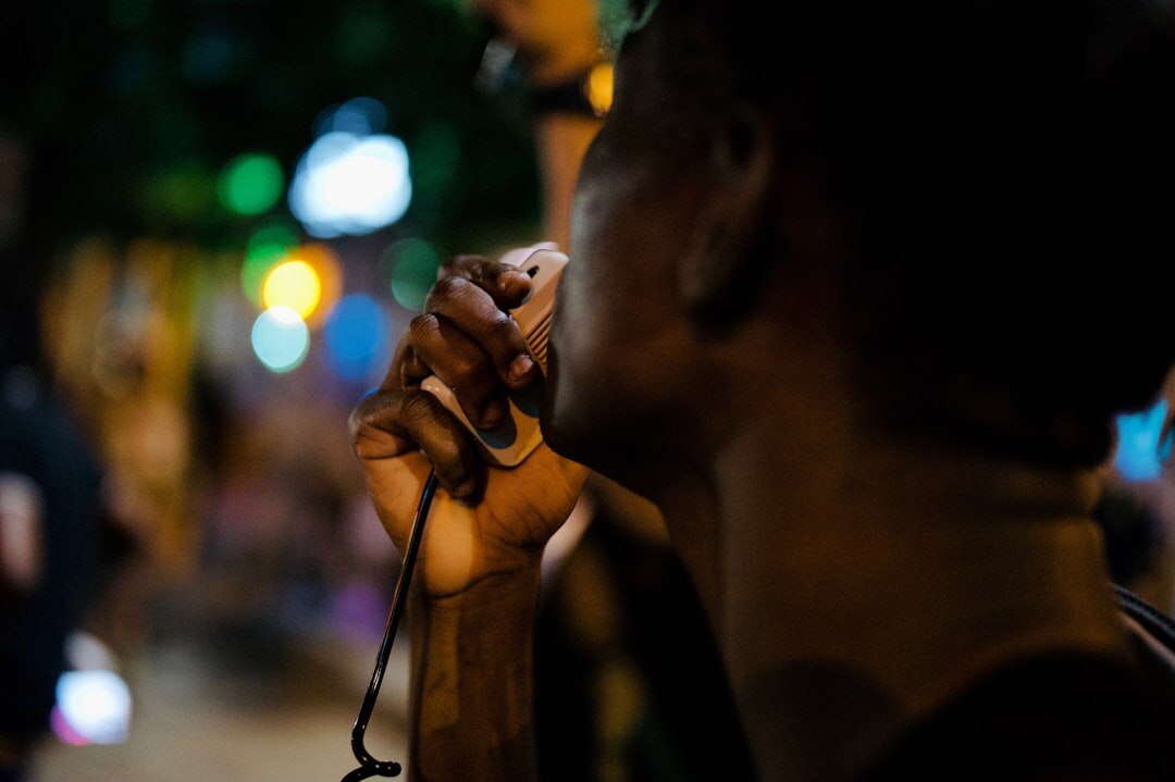 person listening to radio